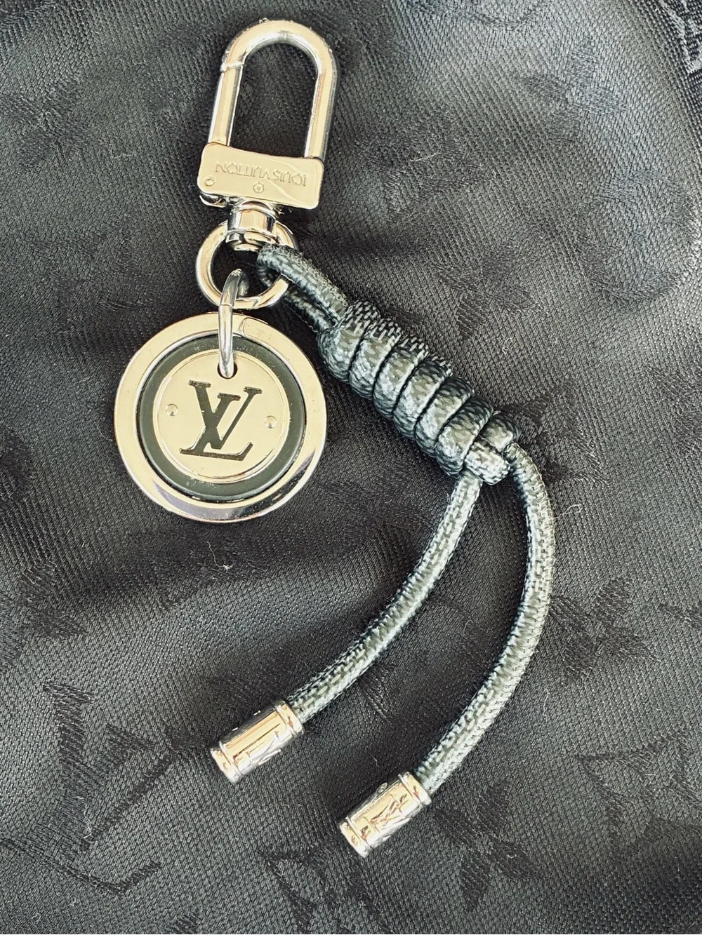 Louis Vuitton Silver LV Circle Medallion & Knotted Graphite Rope Key Holder EUC
